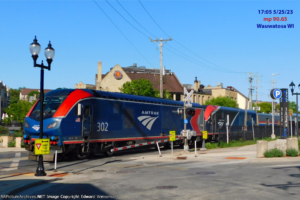 302 and 310 lead Empire Builder 7 thru Harwood Av. {no HORNS} in downtown 'Tosa302 and 310 lead Empire Builder 7 thru Harwood Av. in downtown 'Tosa